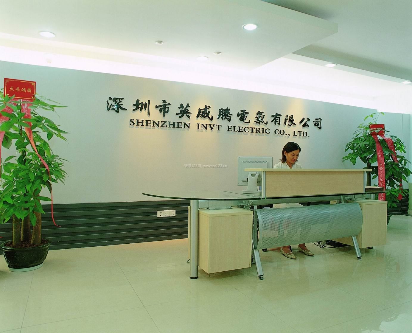 電氣公司前臺(tái)形象墻效果圖_裝修123效果圖